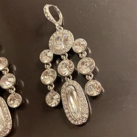 givenchy sun earrings|Givenchy crystal chandelier.